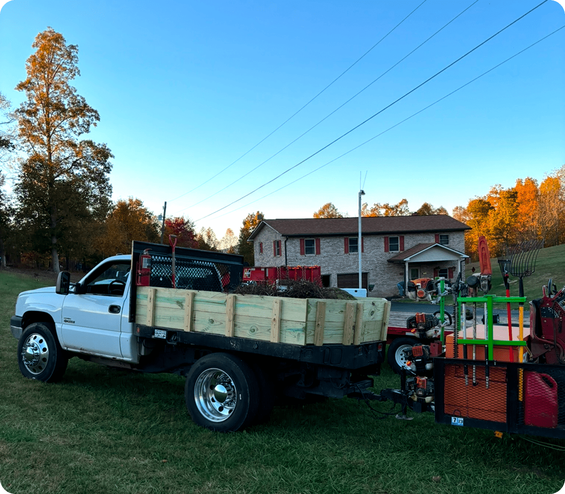 Rural landscape with pickup and equipment